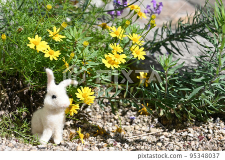 Yellow flower and rabbit doll Yellow flower and rabbit doll 95348037
