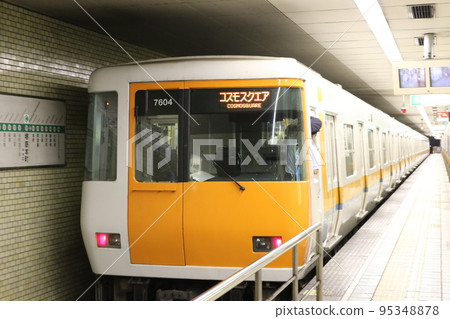 Kintetsu Series 7000 train leaving Sakaisuji-Hommachi Station 95348878