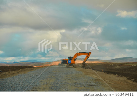 Road running between arctic hills. Autumn season Road running between arctic hills. Autumn season 95349411