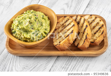 Bowl of guacamole 95349636