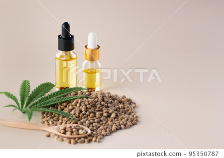 Legalized marijuana concept features with CBD oil for copyspace and advertising. 95350787