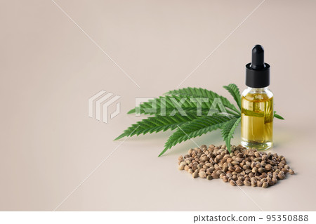 Legalized marijuana concept features with CBD oil for copyspace and advertising. 95350888