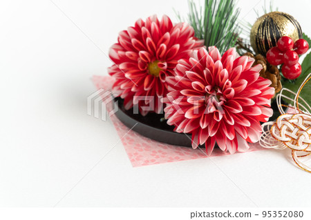 Japanese style background of dahlia and New Year decorations Japanese style background of dahlia and New Year decorations 95352080