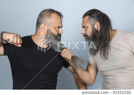 men with long beard in aggressive attitude. men with long beard in aggressive attitude. 95352598