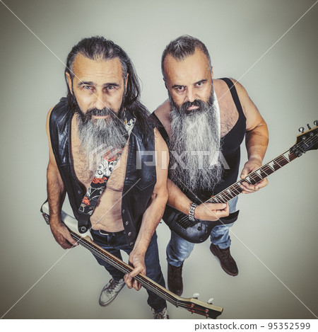 guitarist and bassist with long beards. guitarist and bassist with long beards. 95352599