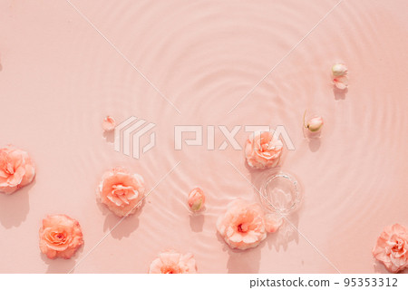 Pink aquatic, transparent water texture with ripples and drops and pink flowers. Water background 95353312