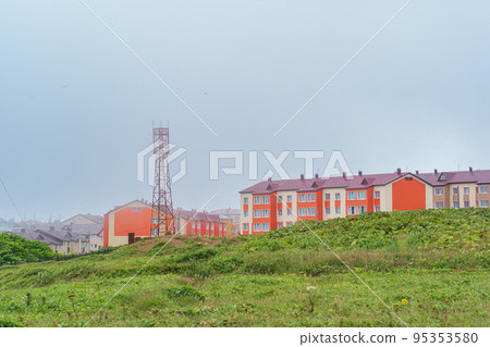 view of the town of Yuzhno-Kurilsk on the island of Kunashir view of the town of Yuzhno-Kurilsk on the island of Kunashir 95353580