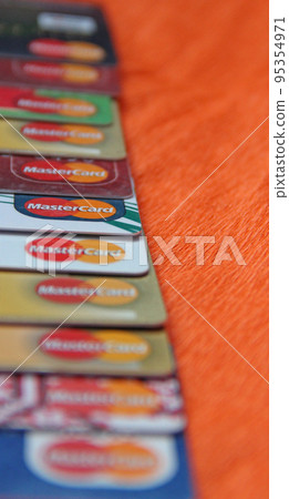 Modern payment systems. Mastercard credit cards close up 95354971