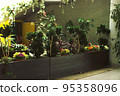 flowers in a planter 95358096