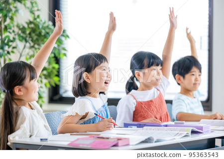 Elementary school students taking classes 95363543