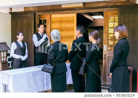 Funeral director (moderator) who accepts at the funeral Funeral director (moderator) who accepts at the funeral 95365024