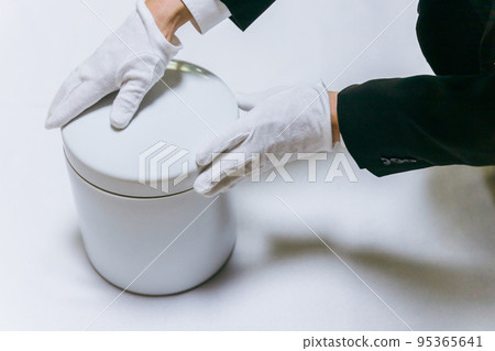 Urns and chopsticks in the crematorium 95365641