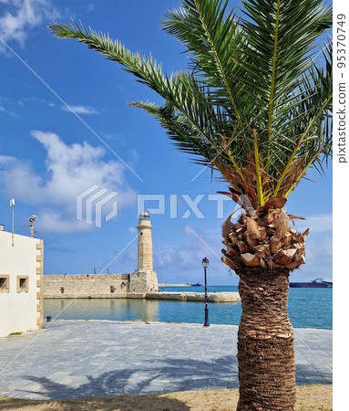 Rethymno lighthouse and palm, Crete, Greece Rethymno lighthouse and palm, Crete, Greece 95370749