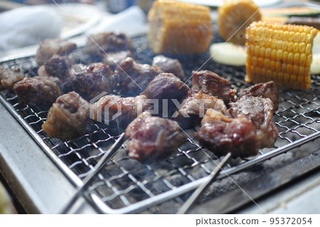 BBQ meat and corn 95372054
