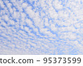 An airplane flying in the bulk cloud 95373599