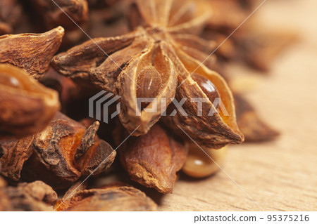 Star anises dried spice fruits Star anises dried spice fruits 95375216