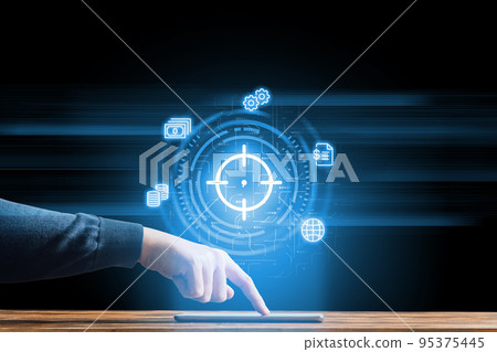 The concept of business goals and achieving goals. Hologram over the tablet by the managing person. 95375445