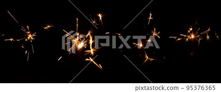 Set of festive sparkler with sparks on black background for overlay blending mode for holiday design projects Set of festive sparkler with sparks on black background for overlay blending mode for holiday design projects 95376365