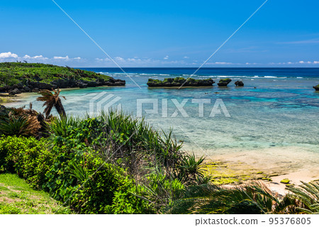 Crystal clear turquoise water full of corals at Hoshizuna beach, Japan. Crystal clear turquoise water full of corals at Hoshizuna beach, Japan. 95376805