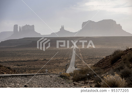 Amazing timelapse view of the infinite road near Monument Valley, Arizona, USA. Scenic views of Monument Valley. 95377205