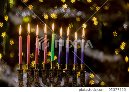 Hanukkah is Jewish holiday that burning of candles with in Hanukkiah Menorah on blurred bokeh background Hanukkah is Jewish holiday that burning of candles with in Hanukkiah Menorah on blurred bokeh background 95377333