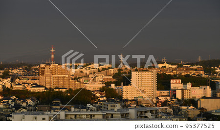 Yokohama cityscape in Japan Looking at the cityscape in the direction of Azamino Station dyed orange in the morning sun 95377525