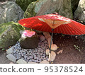 Japanese-style gardens and gardens with red umbrellas Landscape with flowers 95378524