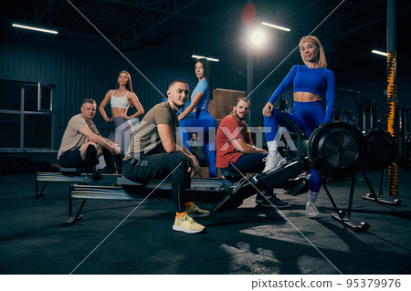 Group of sportive people in a gym. Concepts about lifestyle and