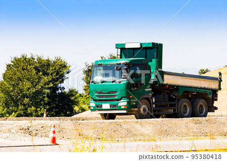 Construction site heavy equipment dump truck 95380418