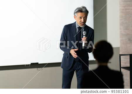 Gray-haired man on stage Gray-haired man on stage 95381101