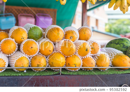 Yellow Mango on market - exotic thai fruits Yellow Mango on market - exotic thai fruits 95382592