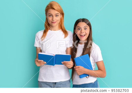 back to school. childhood education. amazed pupil and student. mom and teen girl study. 95382703