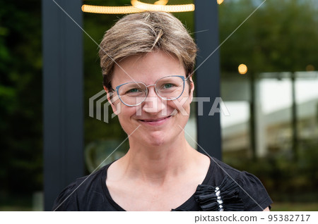 Portrait of a short haired white 35 yo woman Portrait of a short haired white 35 yo woman 95382717