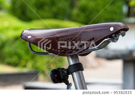 Koekelberg, Brussels, Belgium,  Leather Brooks sattle with a green nature background 95382833