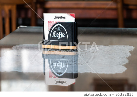 Molenbeek, Brussels Capital Region, Belgium, Beermats of the Jupiler and Leffe Belgian beers Molenbeek, Brussels Capital Region, Belgium, Beermats of the Jupiler and Leffe Belgian beers 95382835