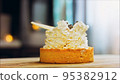 Coconut basket cake with white chocolate decorative leaves. Macro and slider shooting 95382912