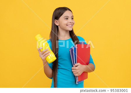 happy teen girl wuth school notebook for making notes hold water bottle, lunch time happy teen girl wuth school notebook for making notes hold water bottle, lunch time 95383001