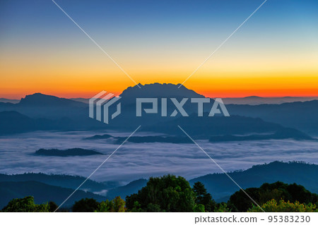 Tropical forest nature landscape view with mountain range sunrise with moving cloud mist at Huai Nam Dang National Park, Chiang Mai Thailand Tropical forest nature landscape view with mountain range sunrise with moving cloud mist at Huai Nam Dang National Park, Chiang Mai Thailand 95383230