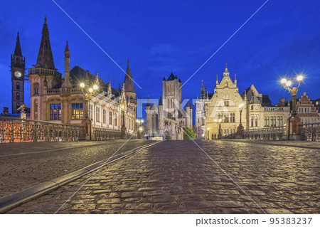 Ghent Belgium, night city skyline at St Michael's Bridge (Sint-Michielsbrug) with Leie River and Korenlei 95383237