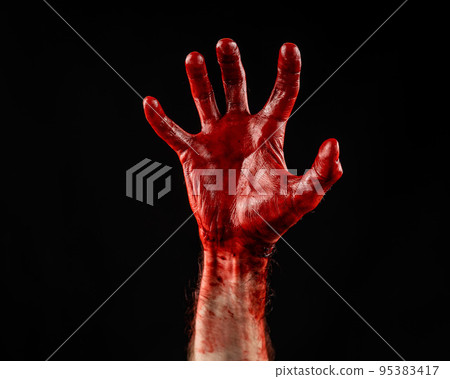 Male palm stained with blood on a black background. 95383417