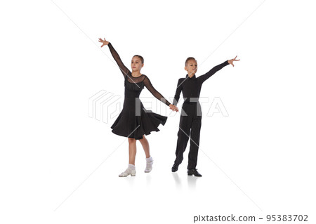 Cha cha cha rumba tango. Two kids school age Stock Photo