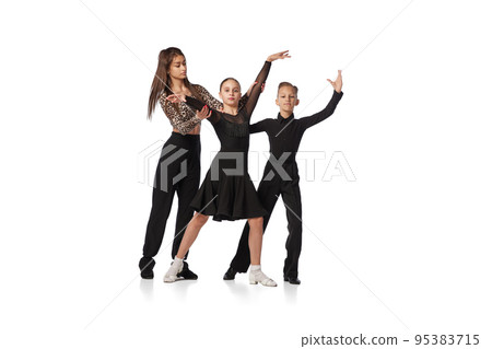 Dance class with personal coach. Two kids, school age girl and boy in black stage costumes studying to dance isolated on white background. Art, education, dance, music, studying 95383715