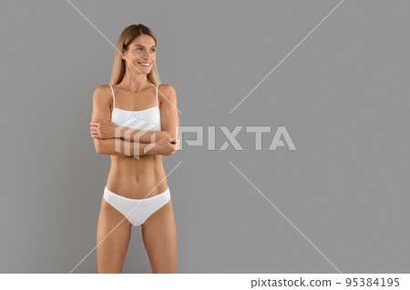 Fit Ad. Beautiful Woman With Sporty Body In Underwear Looking Aside 95384195