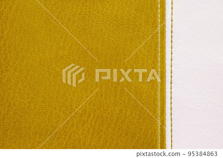 Yellow and white leather with decorative seam texture background Yellow and white leather with decorative seam texture background 95384863