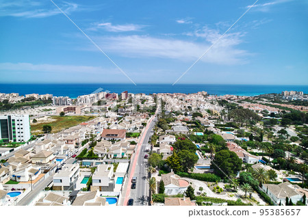 Mil Palmeras townscape and horizon over Mediterranean Sea, Spain 95385657