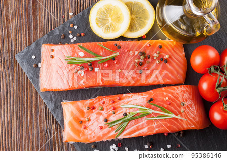 Raw salmon fillet with spices Raw salmon fillet with spices 95386146