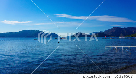 Icmeler Beach view in Marmaris Town. Summer landscape on the Mediterranean coast in Turkey. 95386508