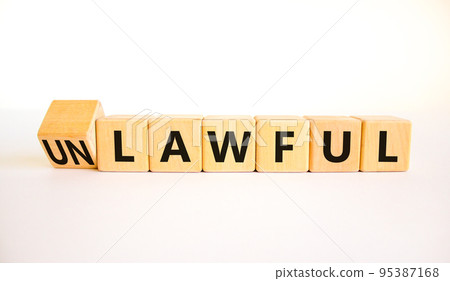 Lawful or unlawful symbol. Turned wooden cubes and changed the concept word Unlawful to Lawful. Beautiful white table white background, copy space. Business and lawful or unlawful concept. Lawful or unlawful symbol. Turned wooden cubes and changed the concept word Unlawful to Lawful. Beautiful white table white background, copy space. Business and lawful or unlawful concept. 95387168