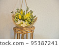 bright yellow flower arrangement 95387241