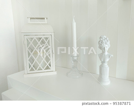 Composition with a candle holder a lantern and a statuette of a woman Composition with a candle holder a lantern and a statuette of a woman 95387871